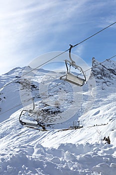 Empty chairlift in a closed ski station