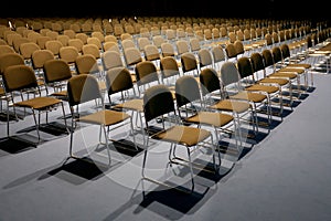 Empty chairs of an auditorium in a congress hall