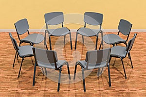 Empty chairs in a circle or meeting room, 3D rendering