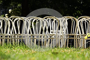 Empty chairs on field