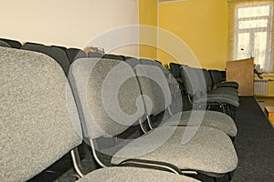 Empty chairs in the hall for the audience, business training center