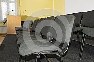 Empty chairs in the hall for the audience, business training center