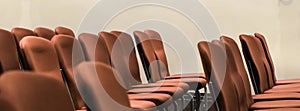 Empty chairs in a hotel conference room, business and interior design