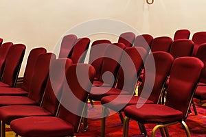 Empty chairs in a hotel conference room, business and interior design