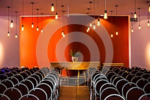 Empty chairs in large Conference hall for Corporate Convention