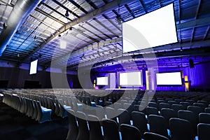 Empty chairs in large Conference hall for Corporate Convention or Lecture