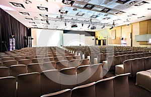 Empty chairs in large Conference hall for Corporate Convention or Lecture