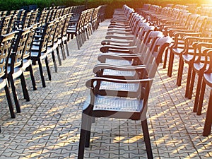 Empty chairs in a rows outdoor before concert or show