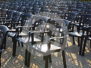 Empty chairs in a rows outdoor before concert or show