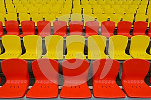 Empty chairs of stadium stands