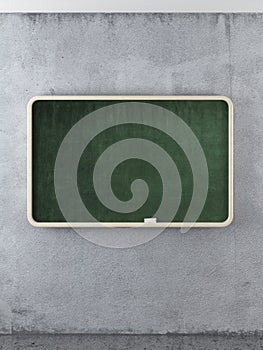 Empty chalk board on the concrete wall