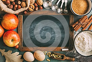 Empty chalkboard and ingredients for baking