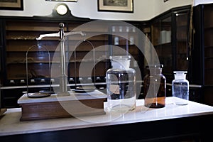 Empty chemical bottles in old pharmacy