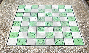 Empty chess board on a marble table