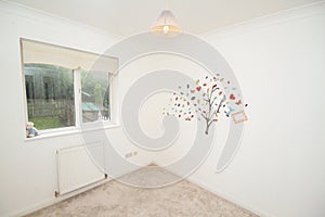 Empty childs bedroom with wall mural