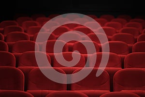 Empty cinema hall with red seats. Movie theatre.