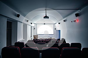 Empty cinema screen with audience