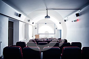 Empty cinema screen with audience