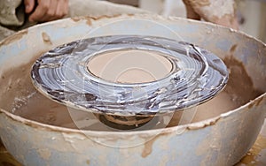 An empty circle, where the potter molds product. Creative studio potter.