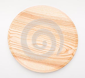 Empty circle wooden tray isolated on white background