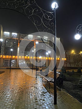 An empty city park at night