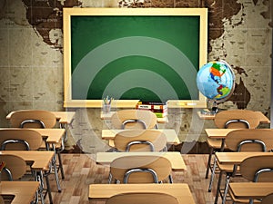 Empty classroom with school desks, chairs and chalkboard.