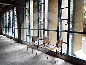 A pile of empty school chairs