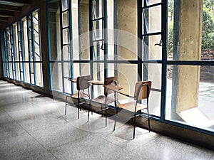 A pile of empty school chairs