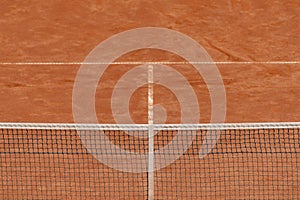 Empty clay tennis court and net. Professional sport concept