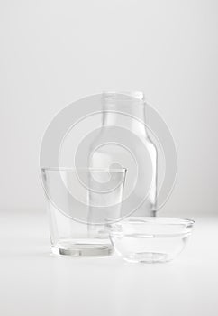 Empty clean glassware on white background