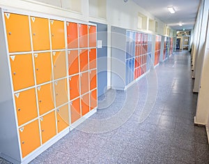 Empty clean hallway corridor classroom with colored furniture lockers and door room at school or university in germany