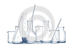 Empty clean laboratory glassware on white background