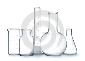 Empty clean laboratory glassware on white background