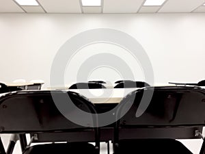 Empty clean room with chairs and tables for training,meeting