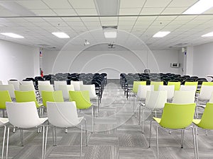 Empty clean room with chairs and tables for training,meeting