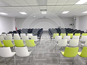 Empty clean room with chairs and tables for training,meeting