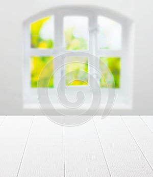 Empty clean white kitchen table and window