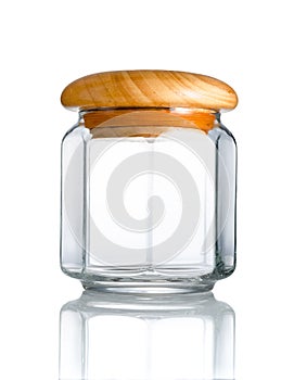 Empty clear glass jar, wood cap in front view, and reflection isolated on white background, Suitable for Mock up creative graphic