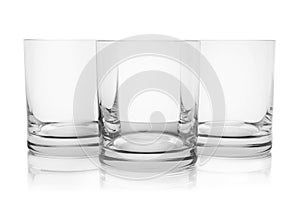 Empty clear lowball glasses on white