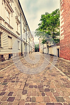 Empty cobblestone old town street in Cracow, Poland