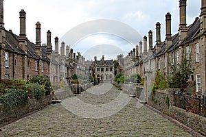 The empty cobblestone street of Vicar`s Close in Wells, Somerset photo
