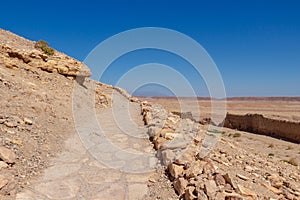 Empty cobblestone trail on the hillside