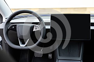 Empty cockpit electric vehicle, Head Up Display and digital speedometer. Steering wheel of electric vehicle, interior