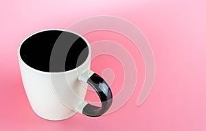 Empty coffee ceramic mug on pink