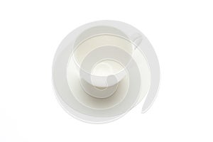 Empty coffee cup and saucer in a white background