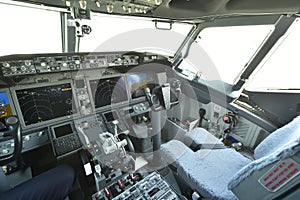 Empty cokpit plane, fly-deck of modern airplane Boeing 737-8 Max.