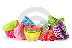 Empty colorful cupcake cases isolated on the white