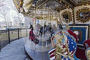 An empty, colorful, old fashion carousel for kids in a park in Philadelphia