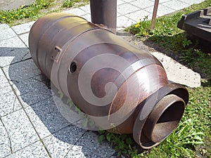 Empty combat shell. Cast-iron bomb body. The product of the old metallurgical cannon factory. Open-air museum. Product of heavy