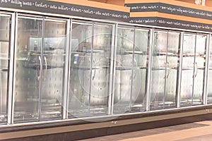 Empty commercial fridges at grocery store in America